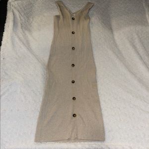 Adorable tan dress with brown buttons!